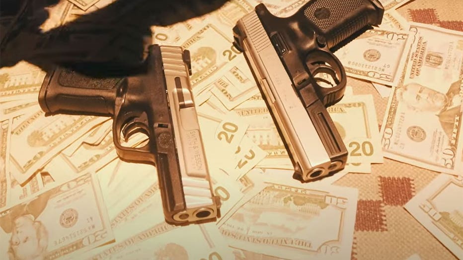 A still frame from the Guns in the Booth music video federal prosecutors say featured illegal guns.