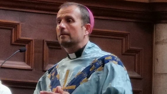 Bishop quits after falling in love with satanic erotica writer