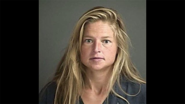 Woman charged with starting wildfire after allegedly trying to boil bear urine