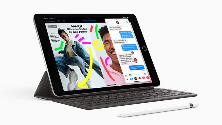 An Apple iPad with optional keyboard and stylus.