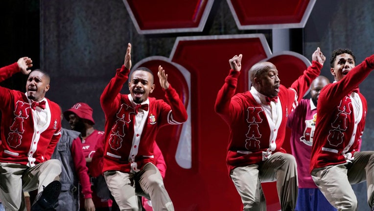 Cast members perform a scene during a rehearsal for Terence Blanchard's "Fire Shut Up in My Bones," at the Metropolitan Opera on September 24, 2021 in New York.