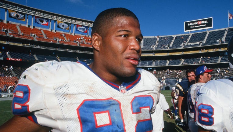 FILE - 27 Sep. 1998: New York Giants defensive end Michael Strahan (92) on the field after the giants defeated the San Diego Chargers 34 to 16 in an NFL football game played on September 27, 1998 at Qualcomm Stadium in San Diego, CA. 