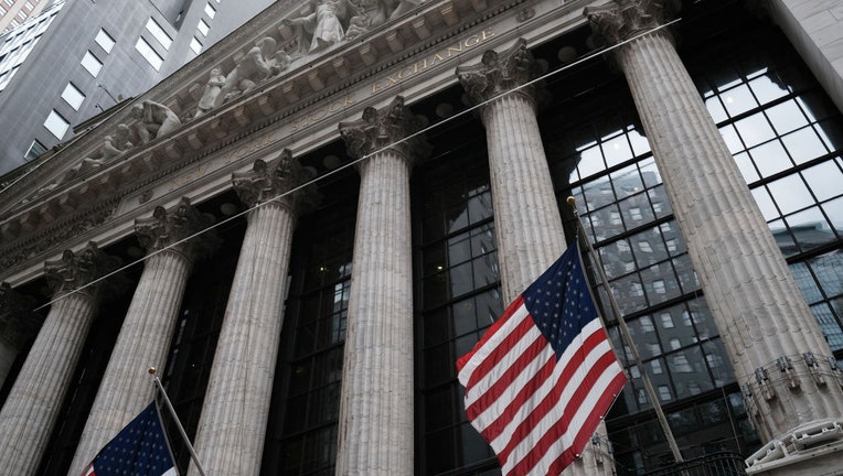 FILE - The New York Stock Exchange (NYSE) stands in lower Manhattan.