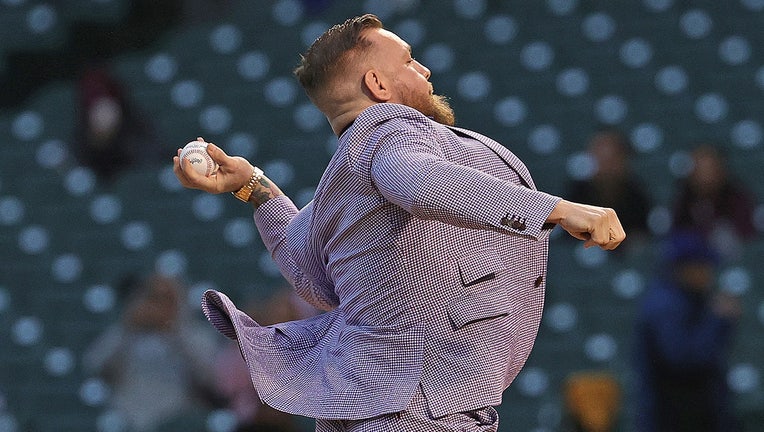 Conor McGregor throws out a ceremonial first pitch before the Chicago Cubs take on the Minnesota Twins at Wrigley Field on September 21, 2021 in Chicago, Illinois. (Photo by Jonathan Daniel/Getty Images)