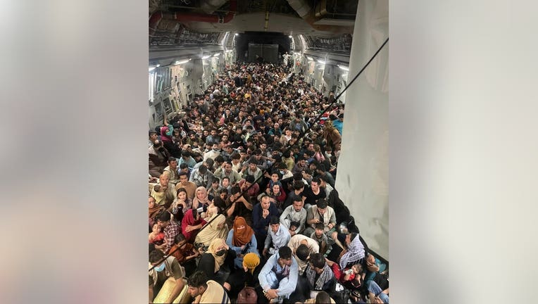A photo shows a U.S. military plane filled with people being evacuated from Afghanistan in August, 2021.(File)