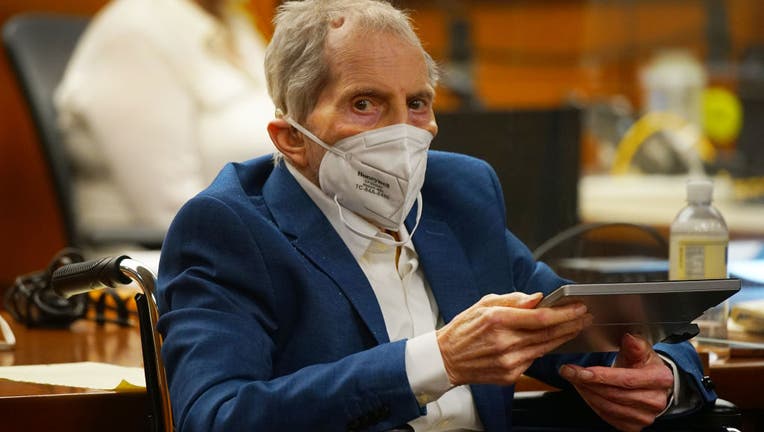 Robert Durst holds a device to read the real time spoken script as he appears before Judge Mark E. Windham during court proceedings in his murder trial at Inglewood Courthouse on May 18, 2021 in Inglewood, California.(Photo by Al Seib-Pool/Getty Images)
