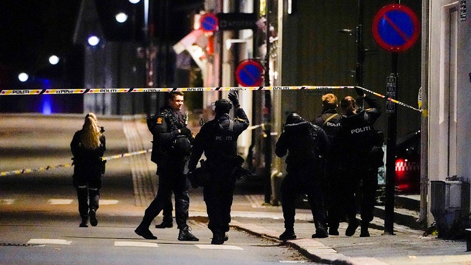 Police officers cordon off the scene where they are investigating in Kongsberg, Norway after a man armed with bow killed several people before he was arrested by police on October 13, 2021.(Photo by HAKON MOSVOLD LARSEN/NTB/AFP via Getty Images)