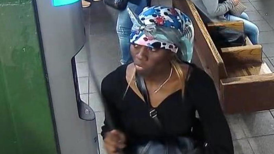 The NYPD released a photo of a woman wanted for shoving a woman into the side of a moving train.