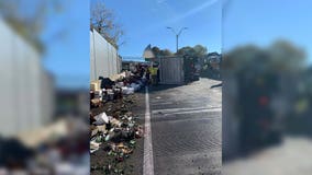 Truck tips over, spilling cases of wine on NC highway