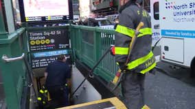 Woman pushed onto tracks at Times Square subway station