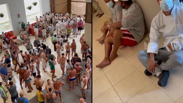 Americans at Cancun LGBT+ event in hiding after men with long guns reportedly storm beach