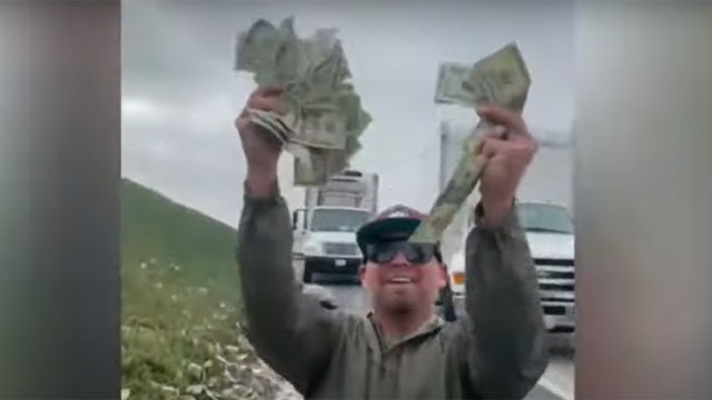 Drivers scramble for cash that falls from armored truck on California freeway