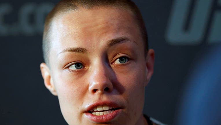 UFC women's strawweight champion Rose Namajunas of Denver, Colo., speaks to journalists at UFC223's media day, Thursday, April 5, 2018, in New York, ahead of her title fight Saturday, April 7, against Joanna Jedrzejczyk at Brooklyn's Barclays Center.