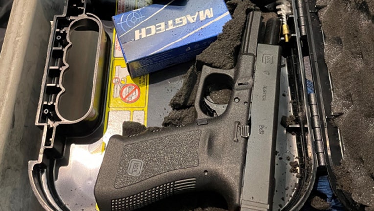 A man was arrested after trying to go through a security checkpoint at Newark-Liberty International with a gun. (TSA photo)