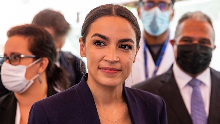 Representative Alexandria Ocasio-Cortez and other elected officials meet with employees at Elmhurst hospital. (Photo by Lev Radin/Pacific Press/LightRocket via Getty Images)