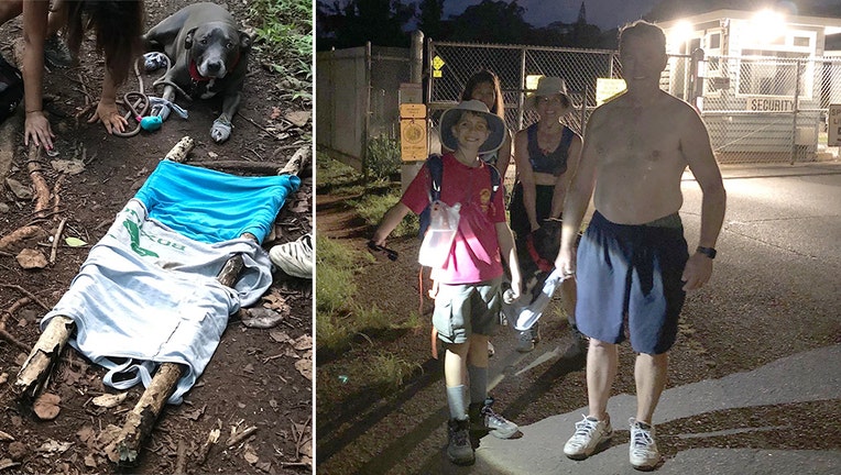 boy scout helps couple dog