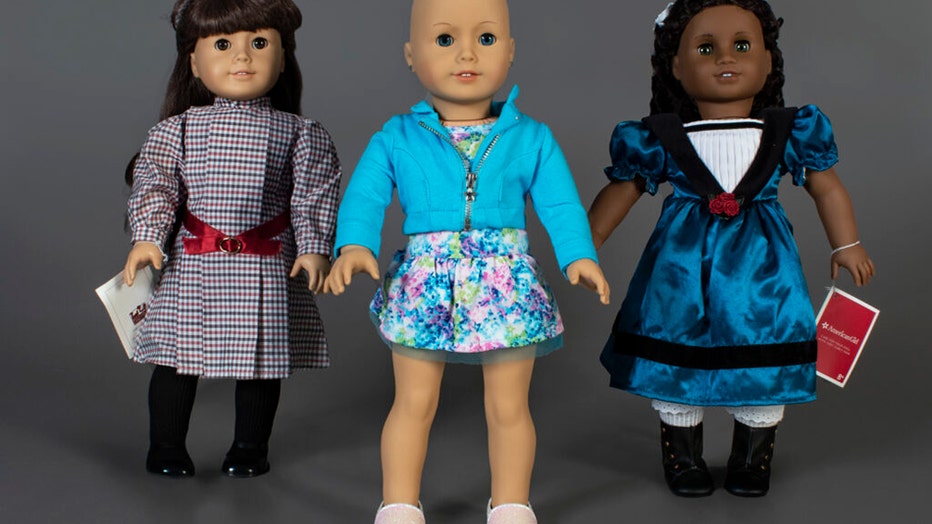 3 dolls with different outfits