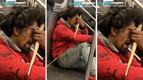 Man threatens to kill woman with wooden spike on NYC subway train