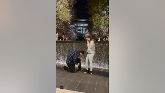 Man drops engagement ring in fountain while proposing at AT&T Stadium