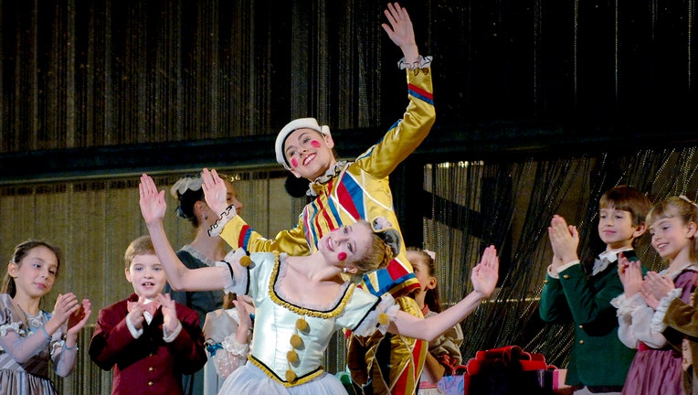 Dancers in costume on stage for the Nutcracker