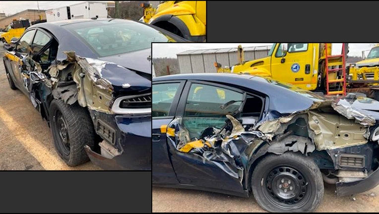 Two photos showing extensive damage to the rear-left side of a state police cruiser