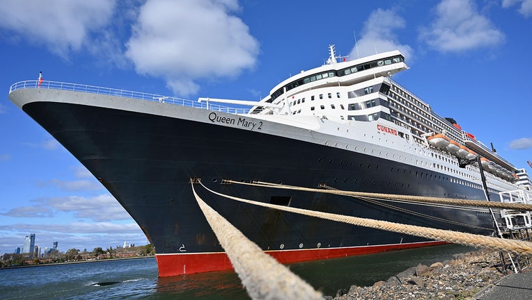 The Cunard ocean liner "Queen Mary 2" is seen docked in Brooklyn, New York, on October 18, 2019. (Photo by ANGELA WEISS/AFP via Getty Images)