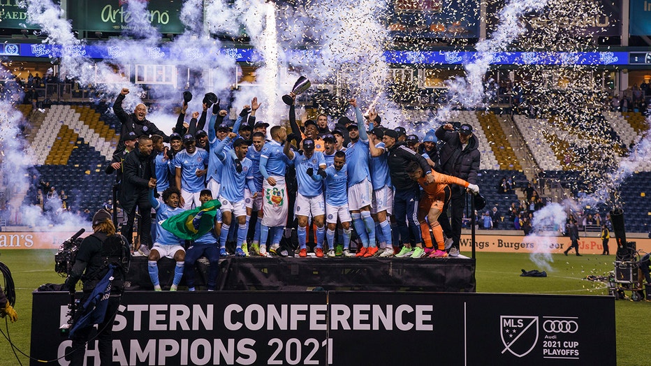 New York City FC celebrates after winning the Eastern Conference Championship following an MLS playoff soccer match against the Philadelphia Union, Sunday, Dec. 5, 2021, in Chester, Pa.