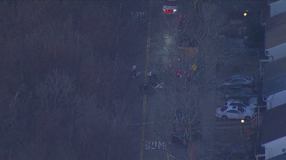 The NYPD responded to a 911 call at 6:21 a.m. about the woman lying on the ground in front of 155-37 Foch Boulevard near Baisley Park. She had gunshot wounds to the chest and back.