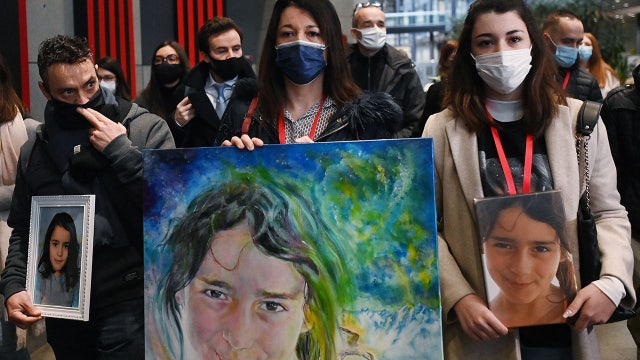 Man goes to trial over killing 8-year-old girl at wedding