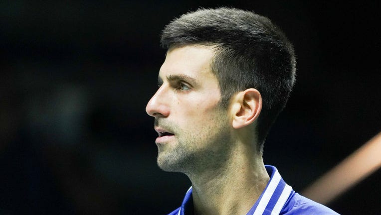 FILE - Novak Djokovic of Serbia in action during the Davis Cup Finals 2021, Semifinal 1, tennis match played between Croatia and Serbia at Madrid Arena Pavilion on Dec. 3, 2021, in Madrid, Spain. (Photo by Oscar Gonzalez/NurPhoto via Getty Images)