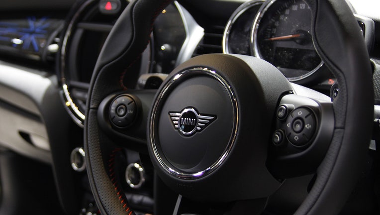 A steering wheel is shown on a Mini. (Photo by Aditya Irawan/NurPhoto via Getty Images)