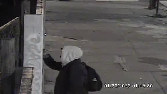 Swastikas, anti-Black slogan drawn on fence in Harlem