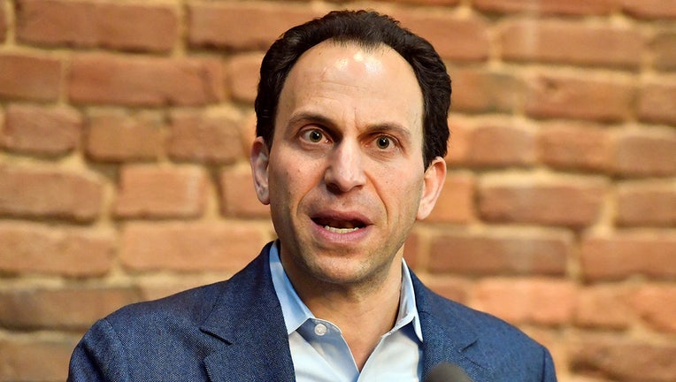 Louisville Democratic mayoral candidate Craig Greenberg speaks during a news conference in Louisville, Ky., Monday, Feb. 14, 2022. Greenberg was shot at Monday morning at a campaign office but was not struck, though a bullet grazed a piece of his clothing, police said. (AP Photo/Timothy D. Easley)