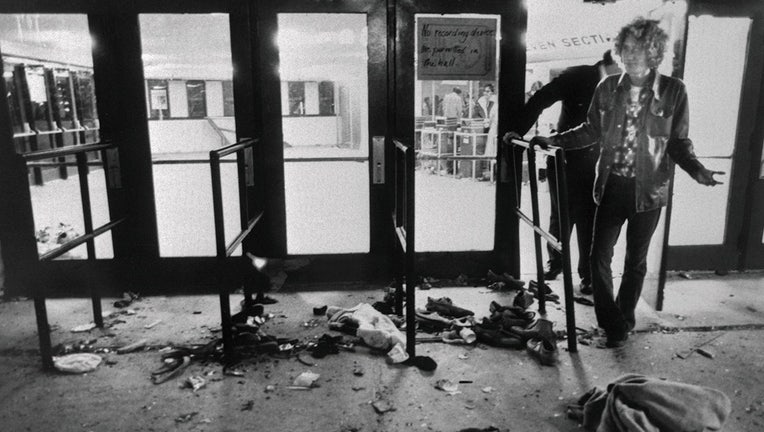 (Original Caption) Debris litters the ground in front of the doors where 11 people were trampled to death as they attempted to enter the Riverfront Coliseum December 3rd for a concert by the rock group, The Who. Numerous injuries were also reported in what one survivor called a "nightmare."