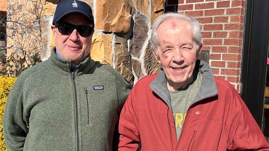 Veteran Ed Norton (at right, in red jacket) with a good friend and neighbor, John Vino, who takes him to church and helps him with errands. (Deirdre Reilly)
