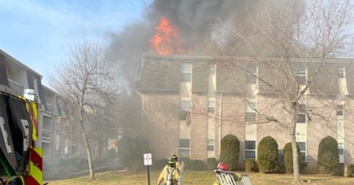 NJ cops and firefighters catch baby dropped from 2nd floor of burning ...