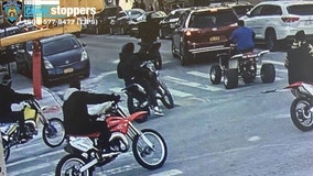 Mob on bikes pull father, son from car, beat and rob them, cops say