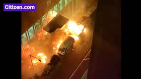 Trash fire burns parked vehicles in Manhattan