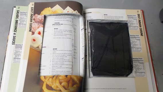 Cocaine hidden inside Caribbean cookbook, feds say