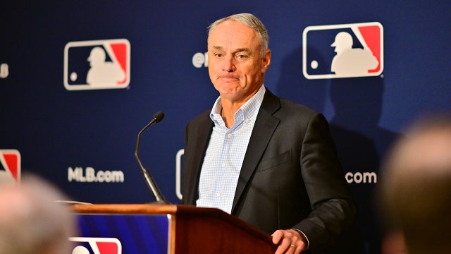 Rob Manfred gets an earful from fans chanting 'We want baseball!'