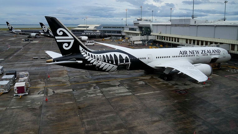 Air New Zealand passenger planes are parked on the tarmac at Auckland International Airport in Auckland, New Zealand, Wednesday, March 23, 2022.