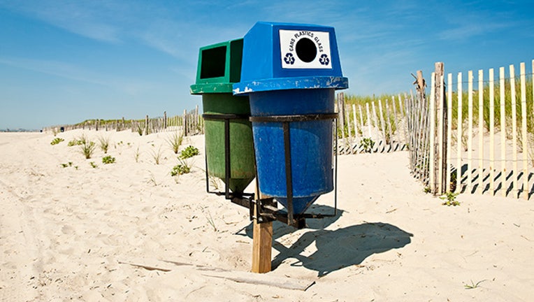 Recycling trash bins on the beach in Stone Harbor, N.J. (Photo by John Greim/LightRocket via Getty Images)