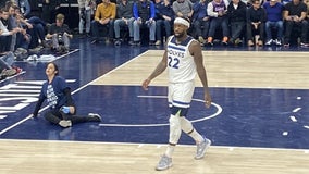 Animal activist glues self to Timberwolves court during play-in game