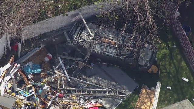MTA patrol vehicle crashes through backyard fence