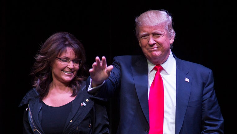 Former Gov. Sarah Palin (R-AK) announces Republican presidential candidate Donald Trump as he speaks at a town hall event on April 2, 2016 in Racine, Wisconsin. Candidates are campaigning in Wisconsin ahead of the Tuesday April 5th primary. (Photo by Darren Hauck/Getty Images)