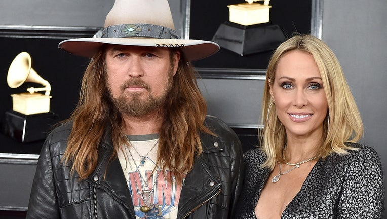 Billy Ray Cyrus and Tish Cyrus attend the 61st Annual GRAMMY Awards at Staples Center on February 10, 2019 in Los Angeles, California. (Photo by Axelle/Bauer-Griffin/FilmMagic)