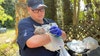 Cat rescued from fire; paramedic gives it oxygen