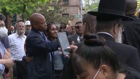 Can hits sidewalk while Mayor Adams chats with Brooklyn residents