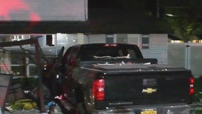 Truck slams into Long Island house