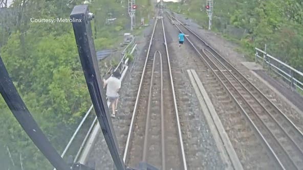 Group of teens trespassing on railroad narrowly dodge oncoming train